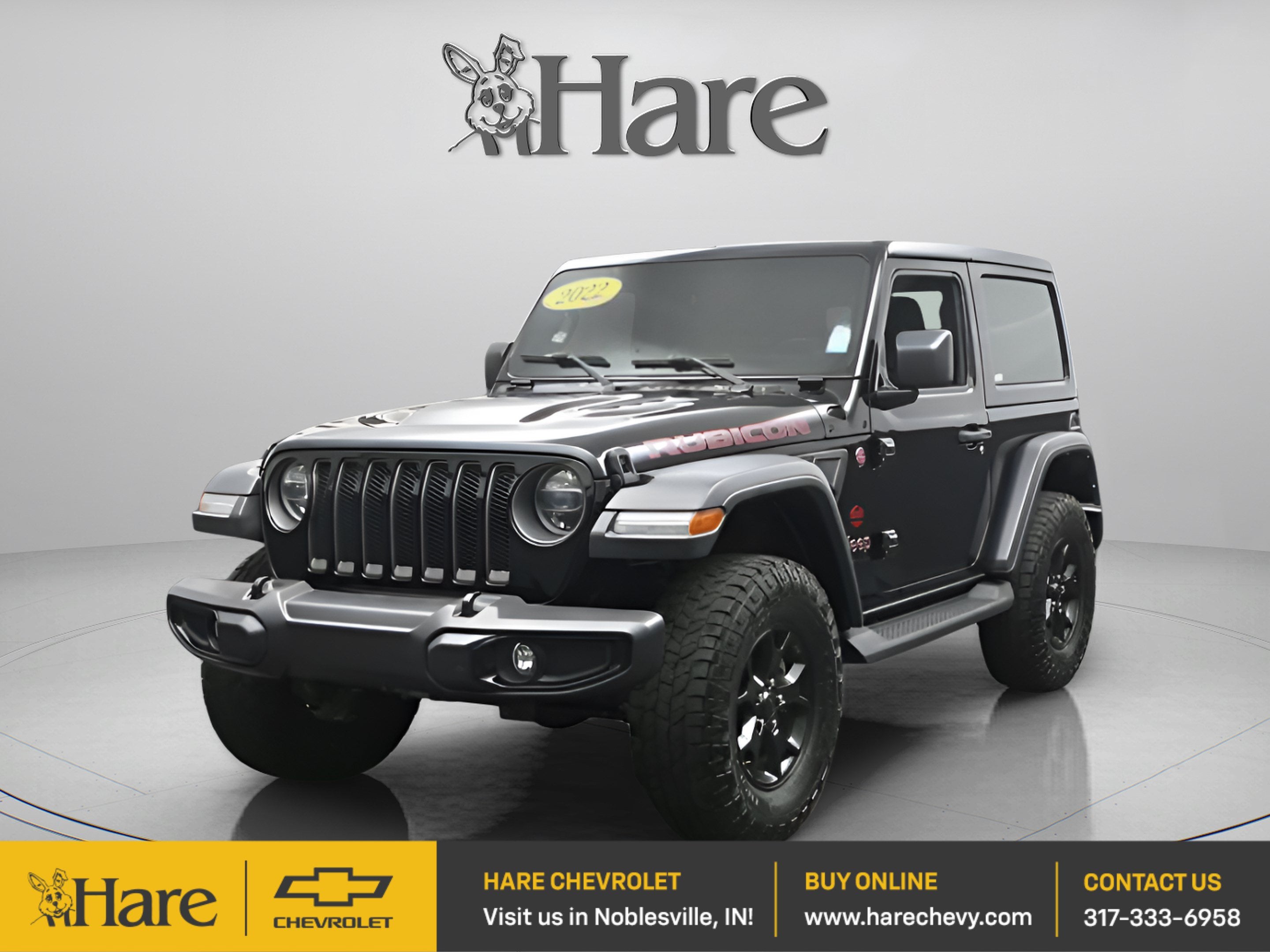 2022 Jeep Wrangler Rubicon in Black Clearcoat — front three-quarter view