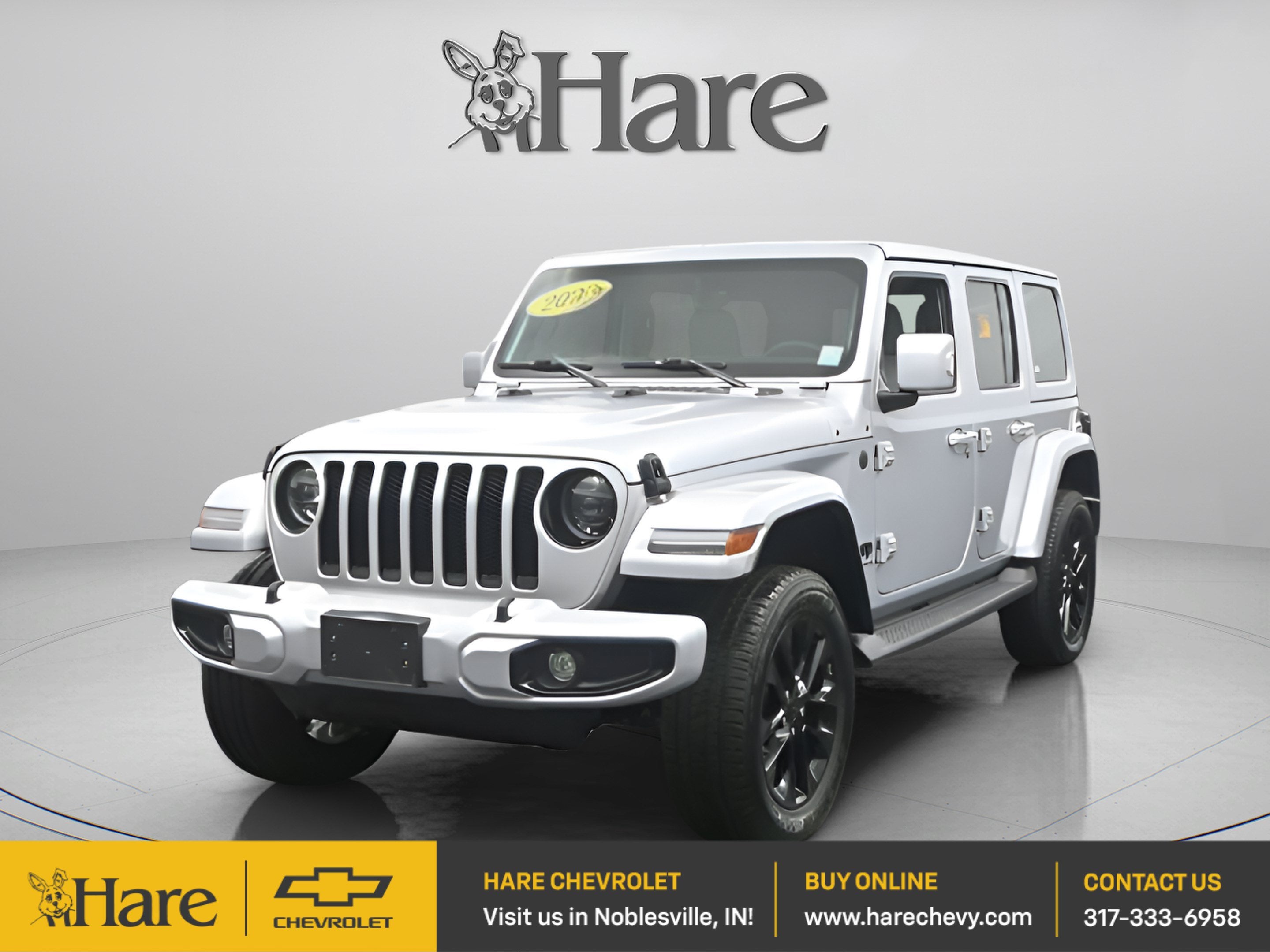 2023 Jeep Wrangler 4-Door High Altitude 4x4 in Silver — front three-quarter view