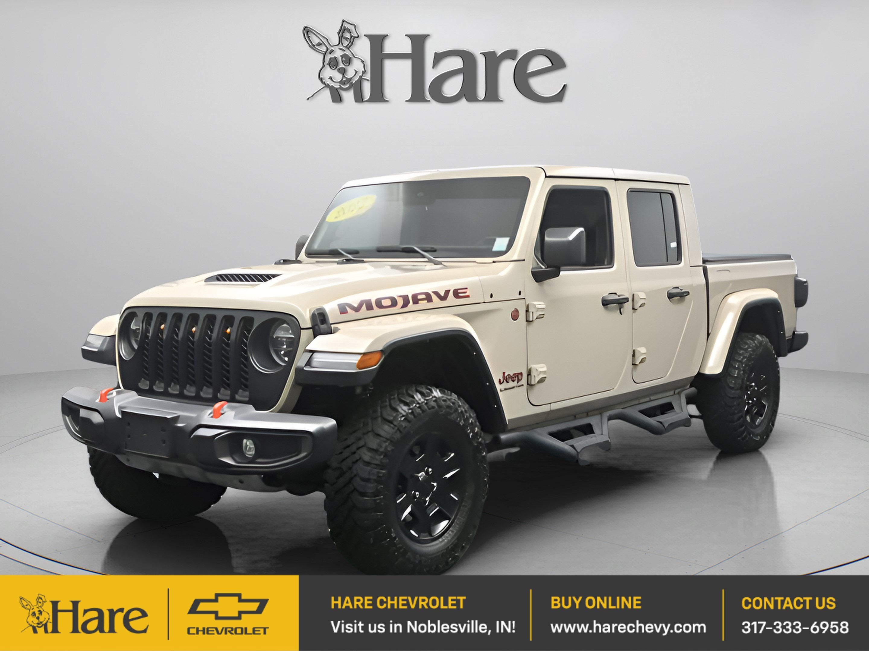 2022 Jeep Gladiator Mojave in Limited Edition Gobi Clearcoat — front three-quarter view