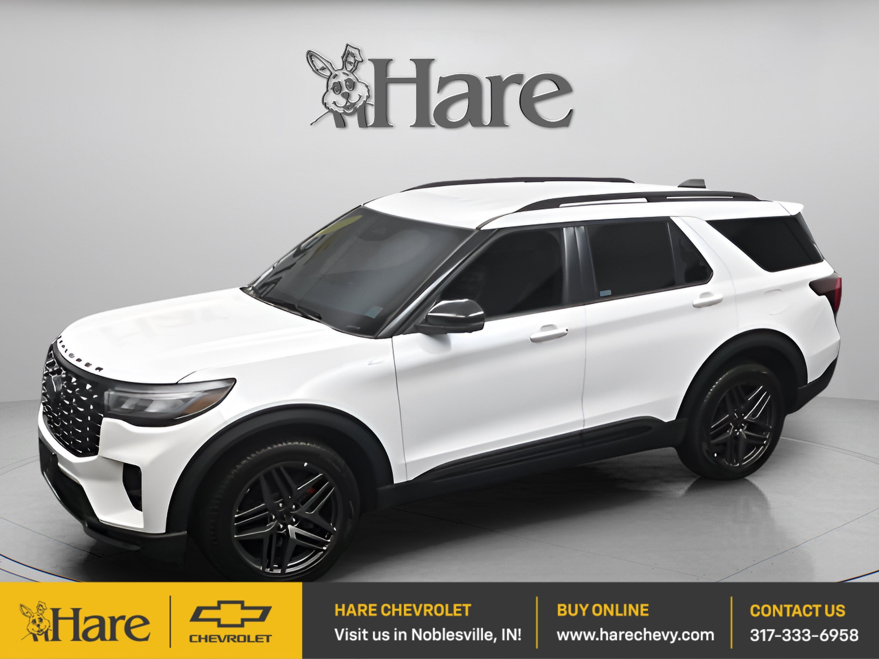 2025 Ford Explorer ST-Line in White Metallic — front three-quarter view