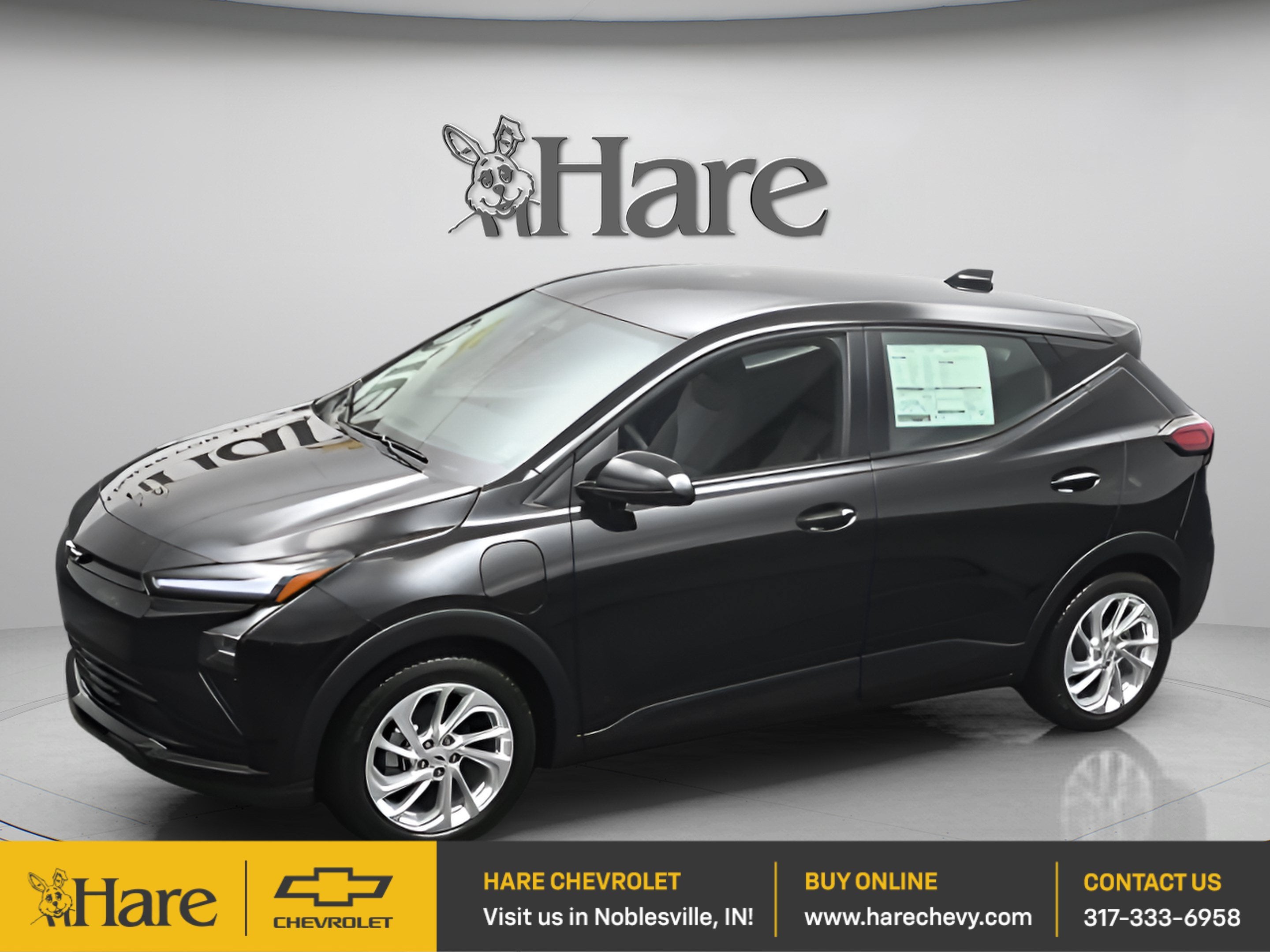 2027 Chevrolet Bolt LT in Mosaic Black Metallic — front three-quarter view