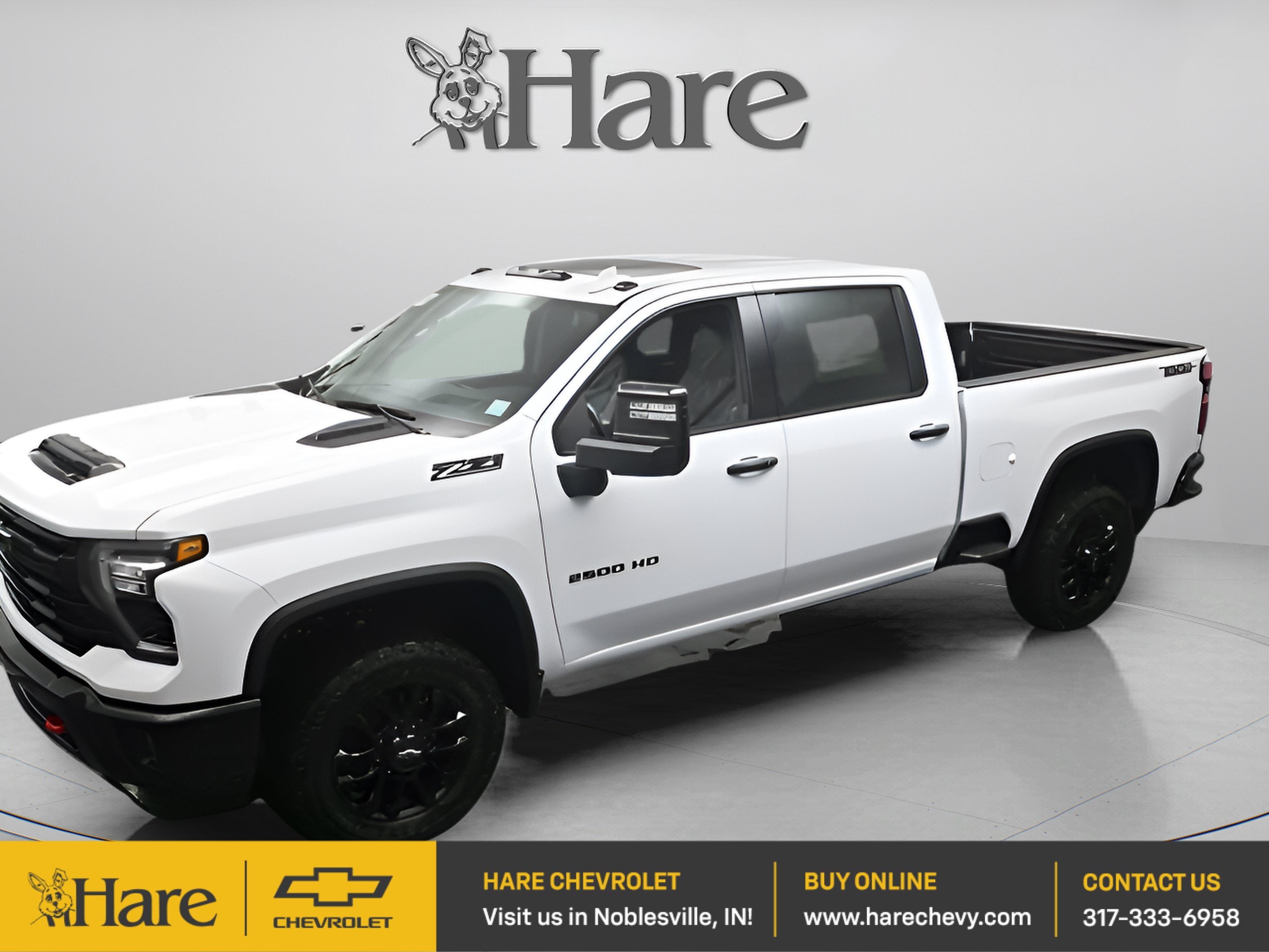 2026 Chevrolet Silverado 2500 HD LTZ in Summit White — front three-quarter view