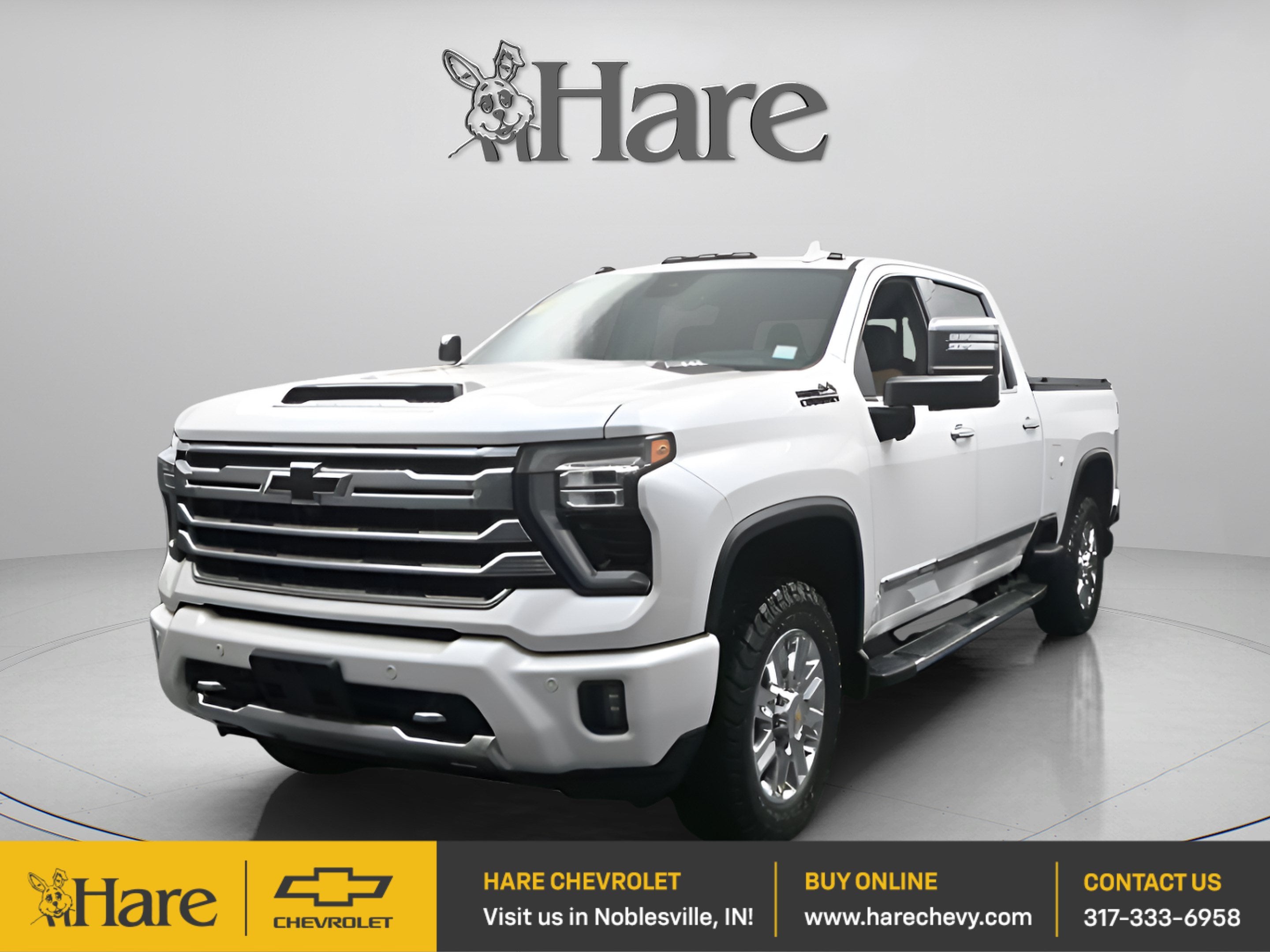 2024 Chevrolet Silverado 3500 HD High Country in Iridescent Pearl Tricoat — front three-quarter view