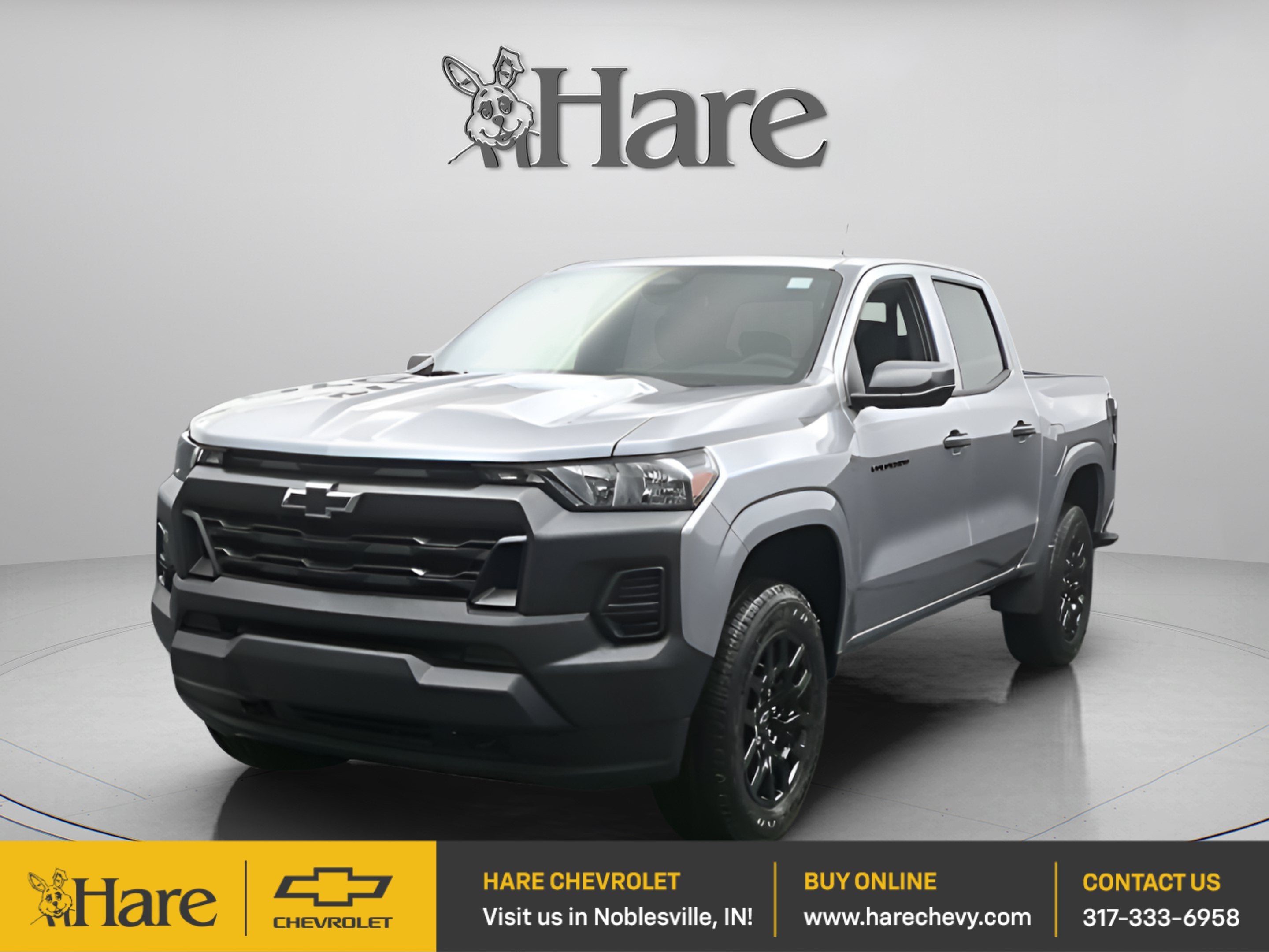 2026 Chevrolet Colorado WT in Sterling Gray Metallic — front three-quarter view