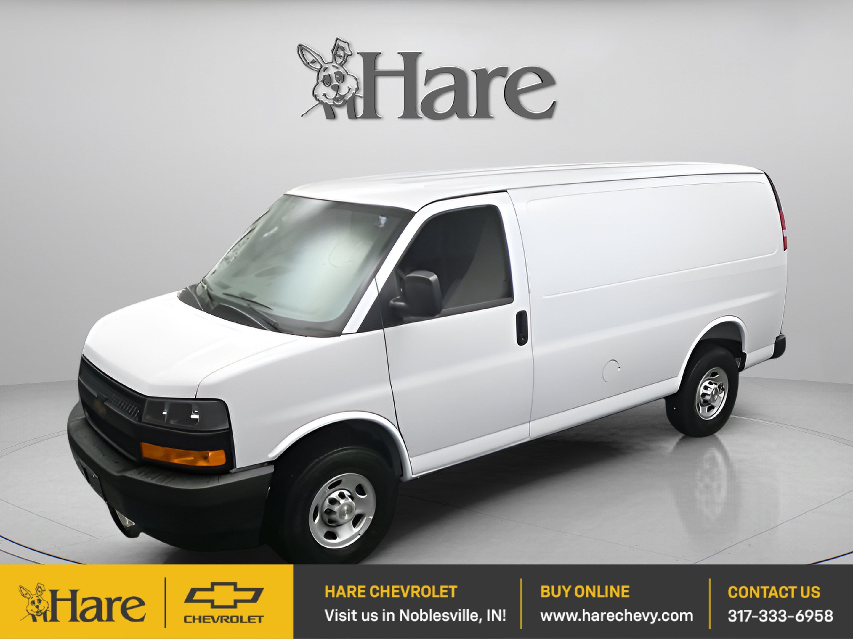 2026 Chevrolet Express Cargo WT in Summit White — front three-quarter view