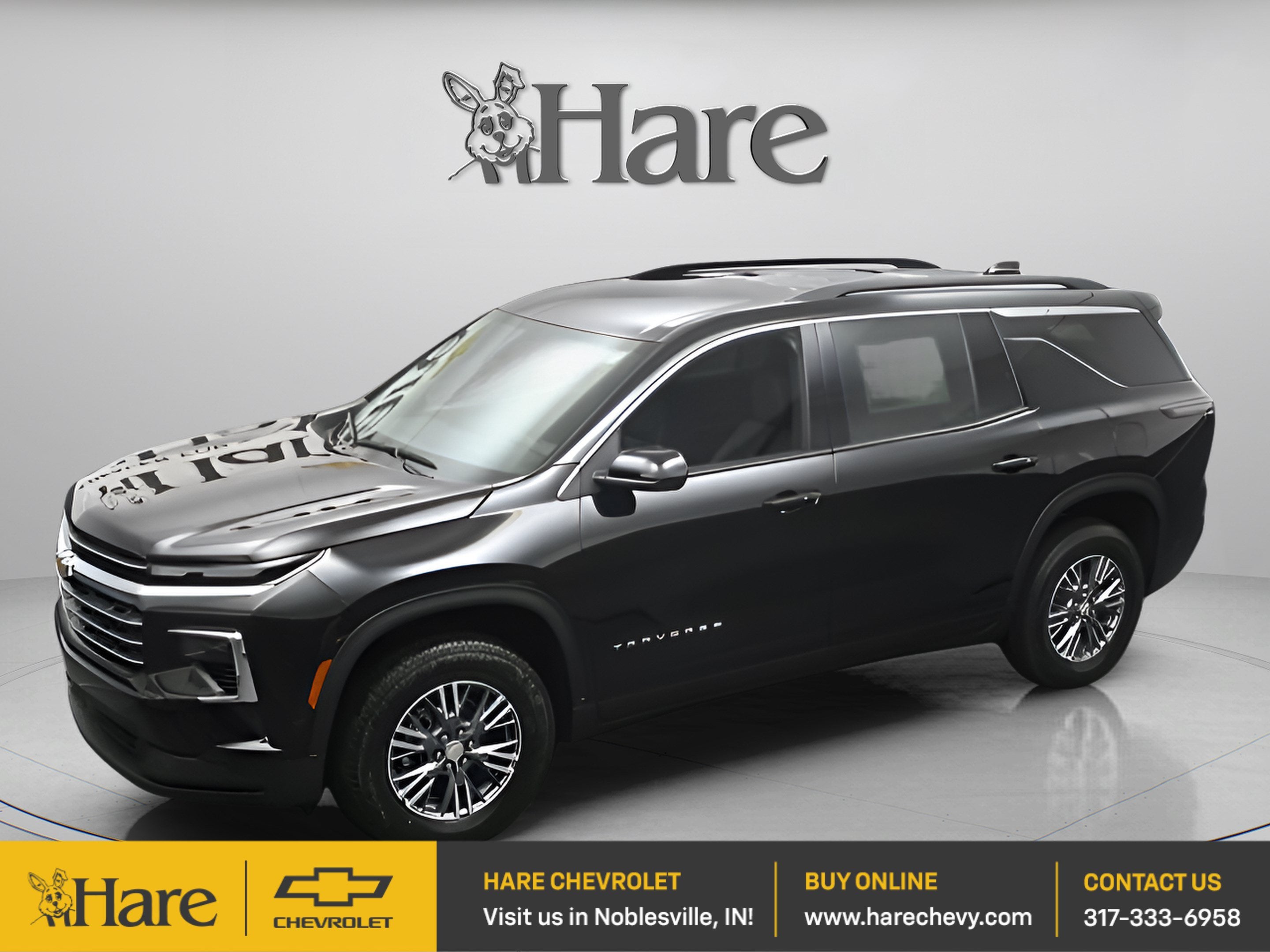 2026 Chevrolet Traverse LT in Mosaic Black Metallic — front three-quarter view