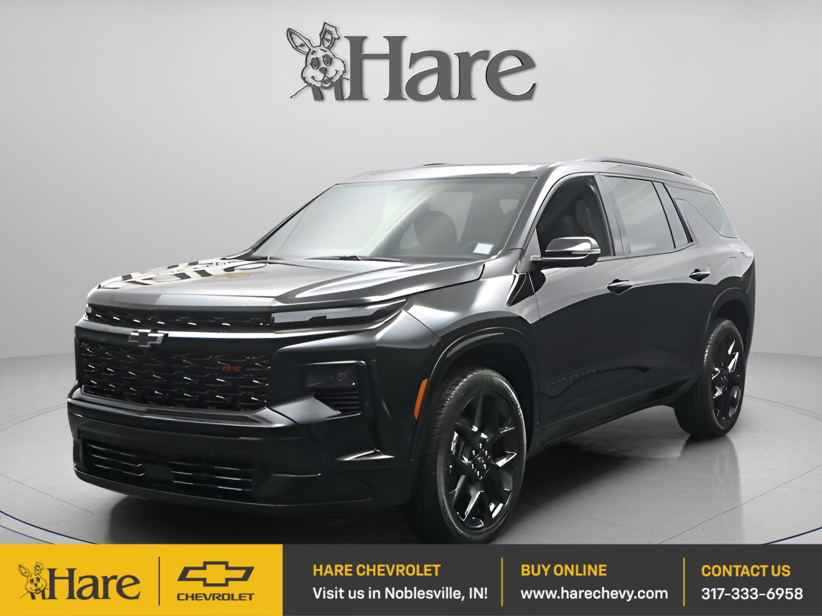 2026 Chevrolet Traverse RS in Mosaic Black Metallic — front three-quarter view