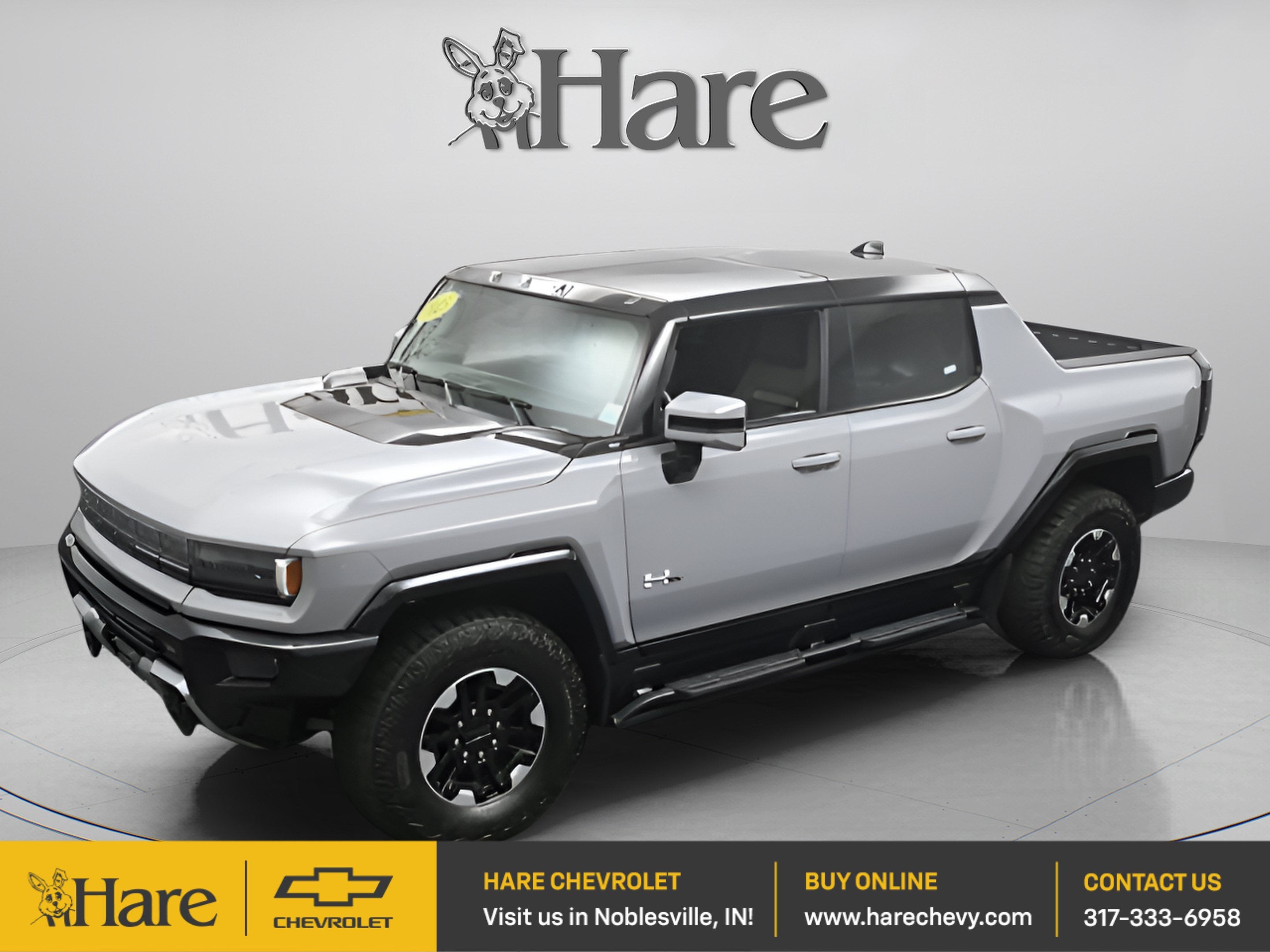 2025 GMC HUMMER EV Pickup 3X in Meteorite Metallic (Grey) — front three-quarter view