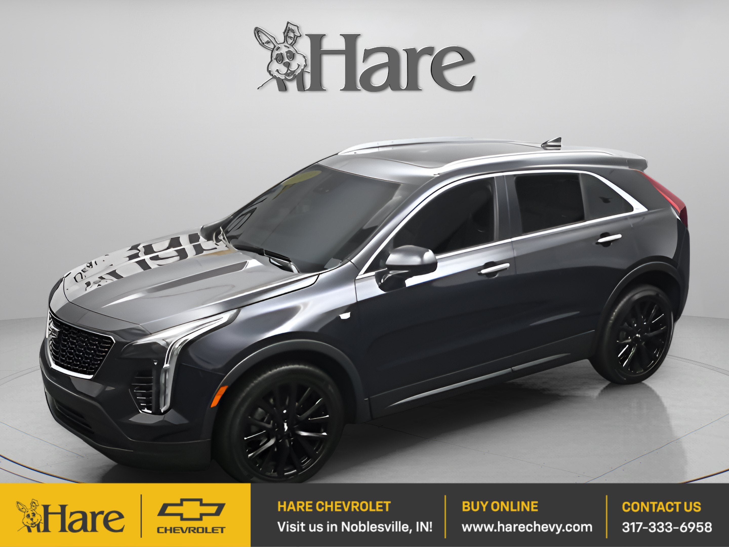 2023 Cadillac XT4 Luxury in Galactic Grey Metallic — front three-quarter view