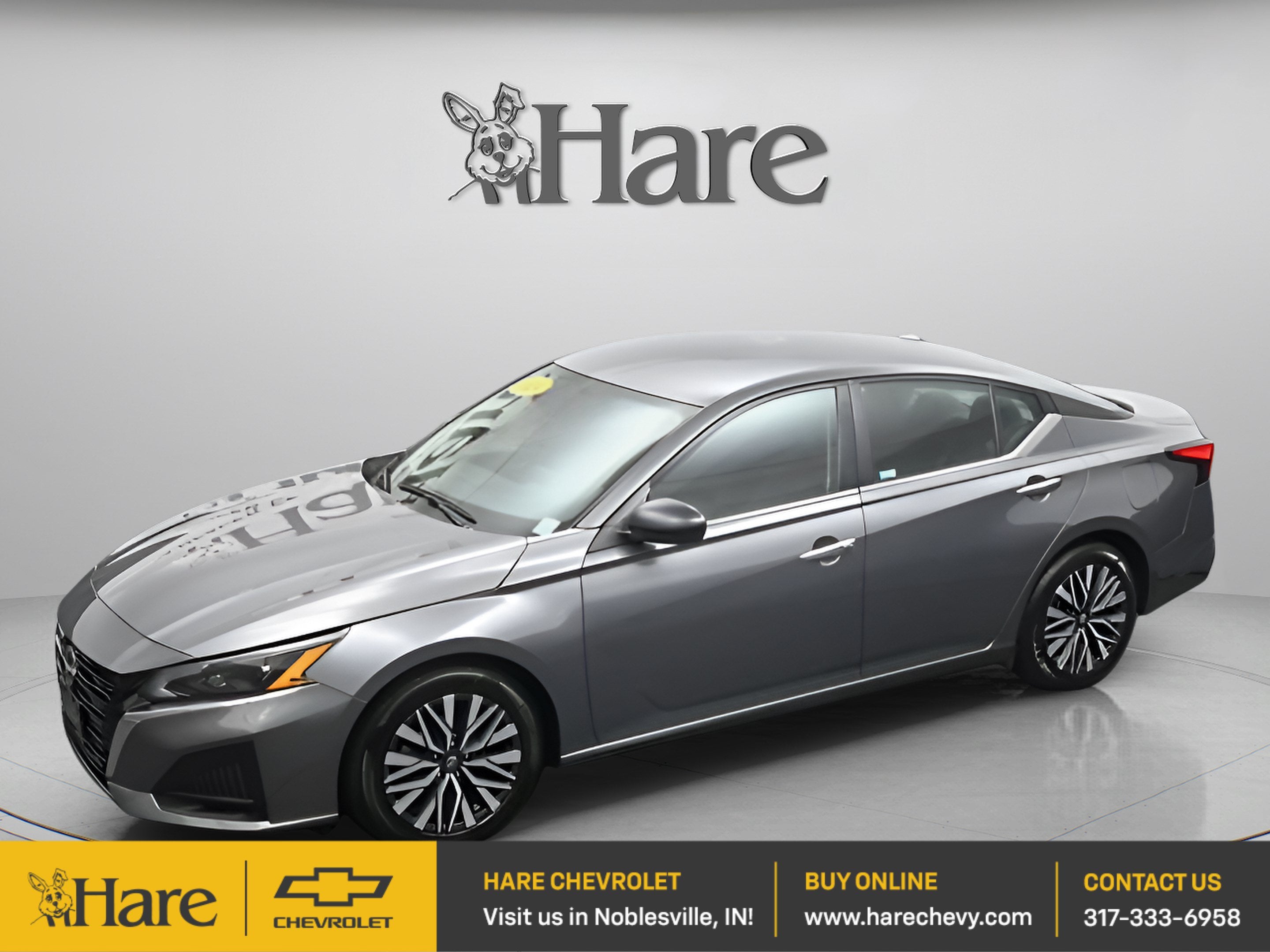 2024 Nissan Altima 2.5 SV in Gun Metallic — front three-quarter view