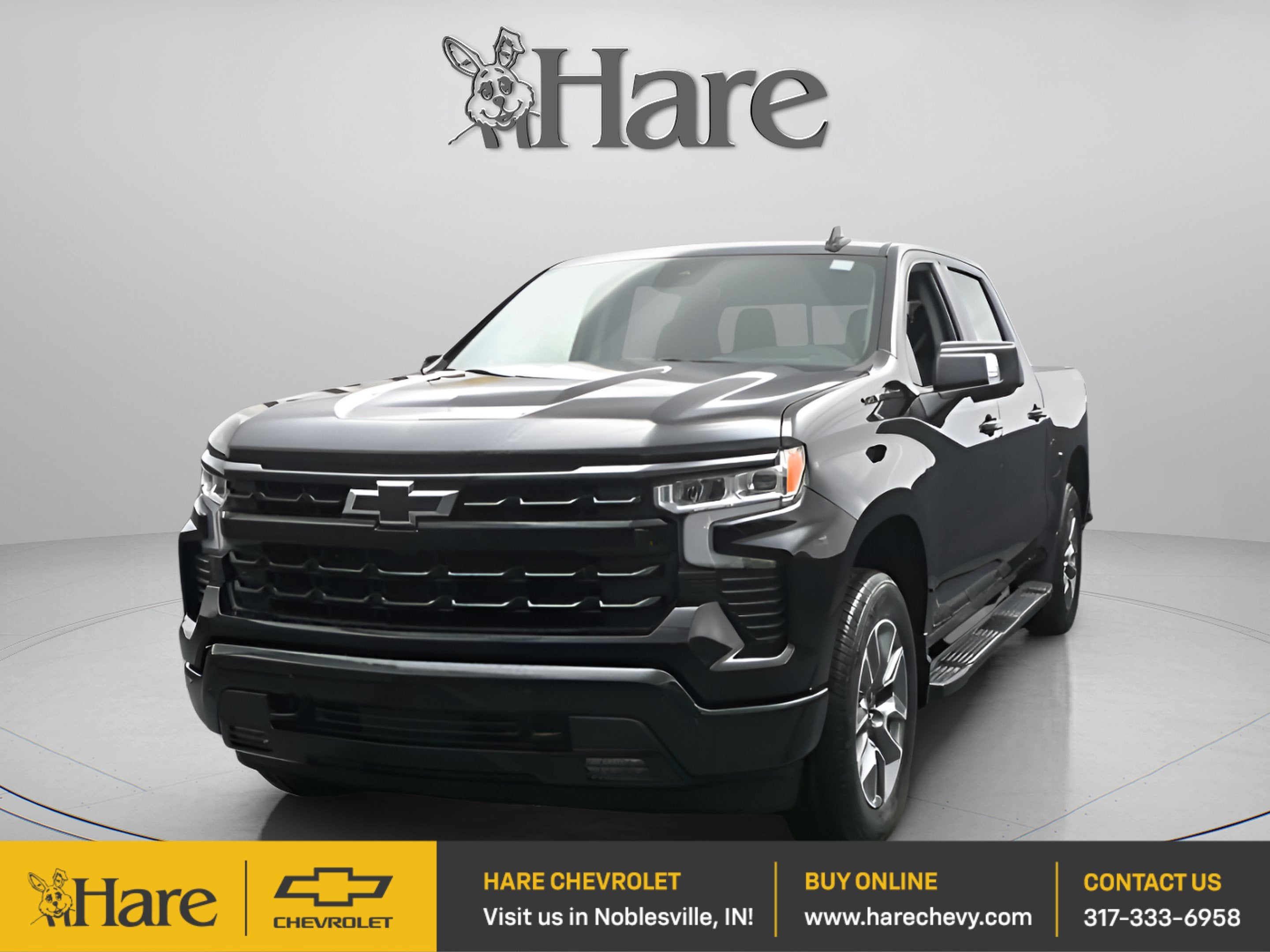 2026 Chevrolet Silverado 1500 RST in Black — front three-quarter view