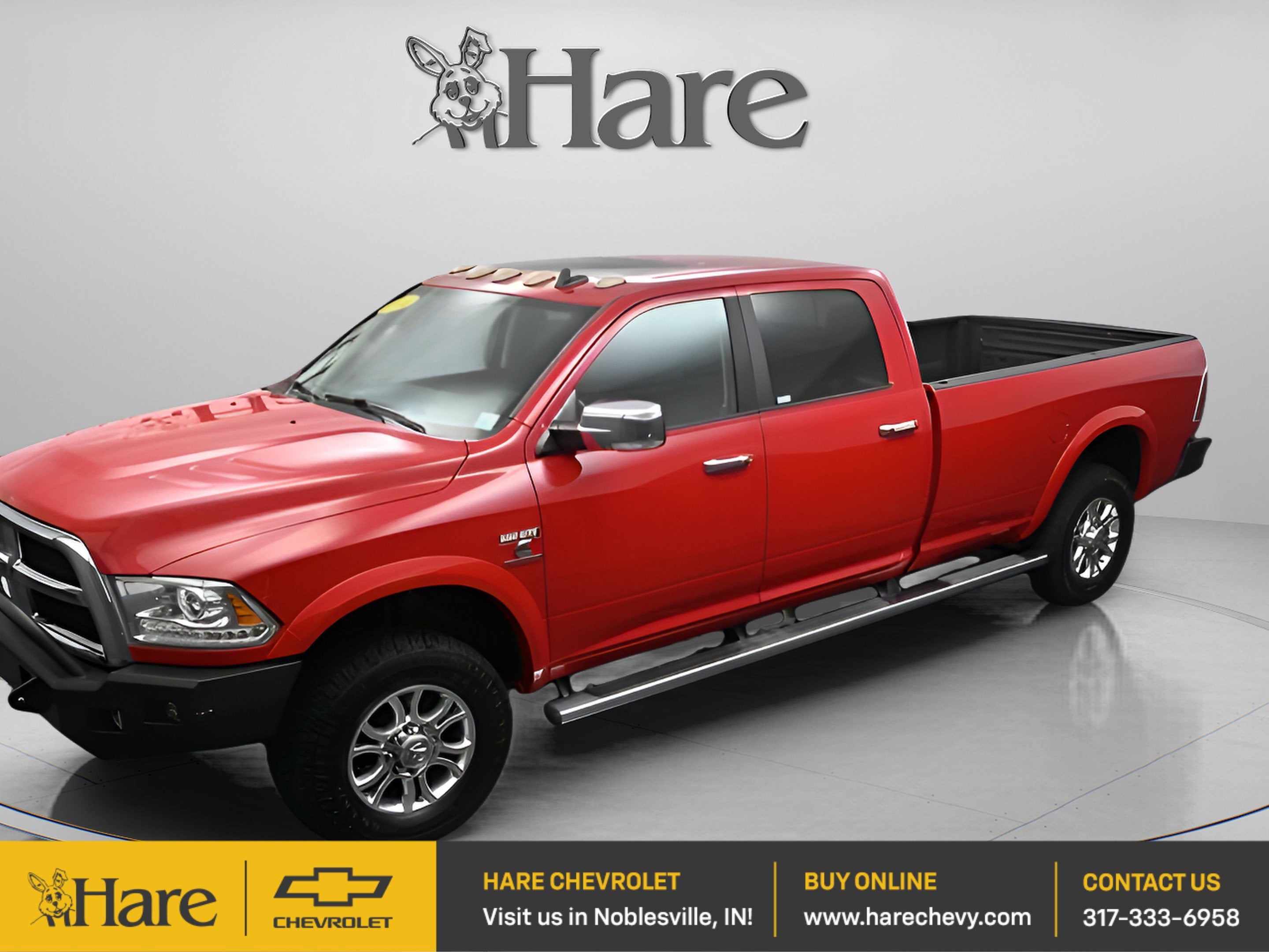 2014 RAM 2500 Laramie in Red — front three-quarter view