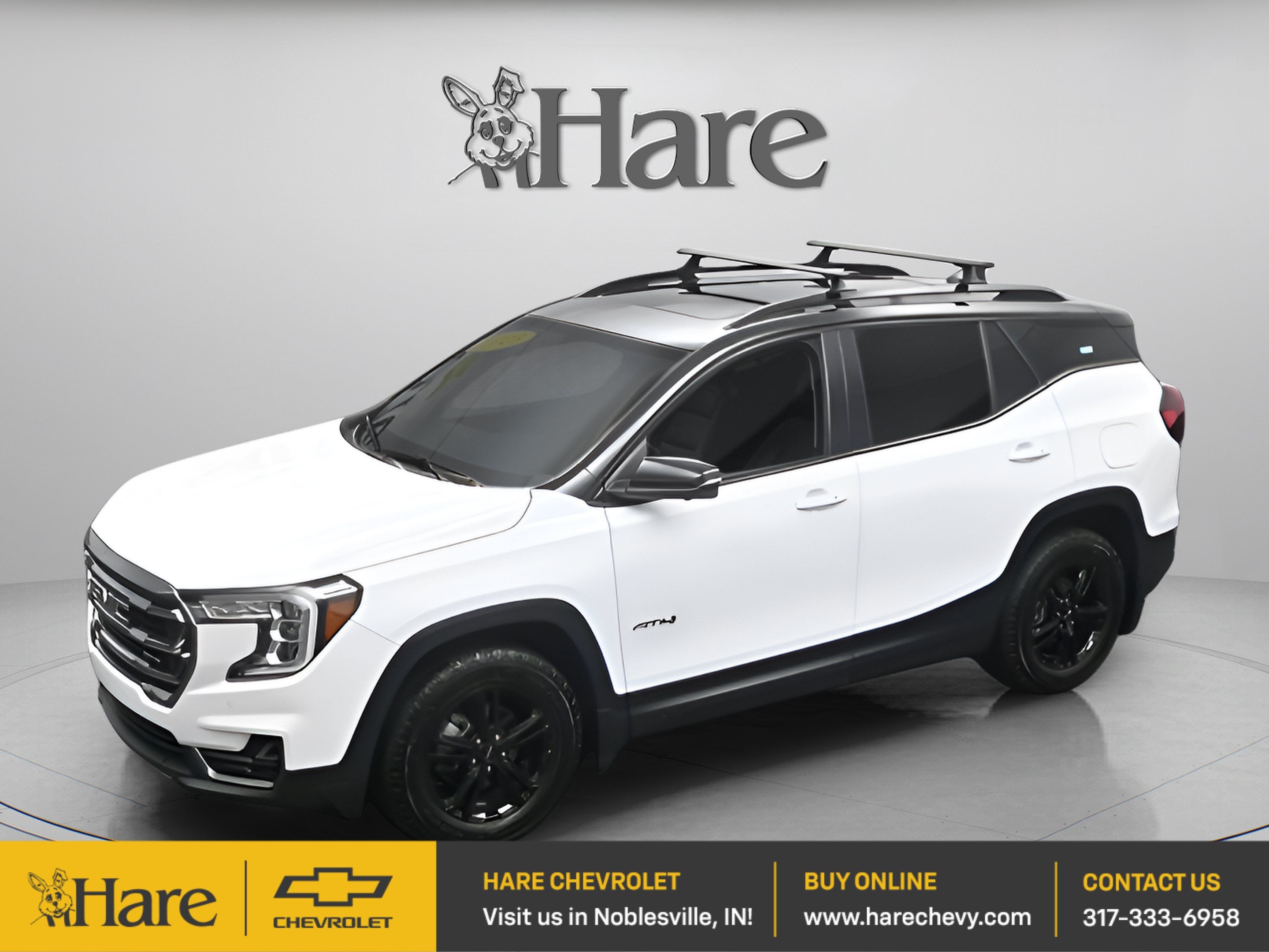 2023 GMC Terrain AT4 in Summit White — front three-quarter view