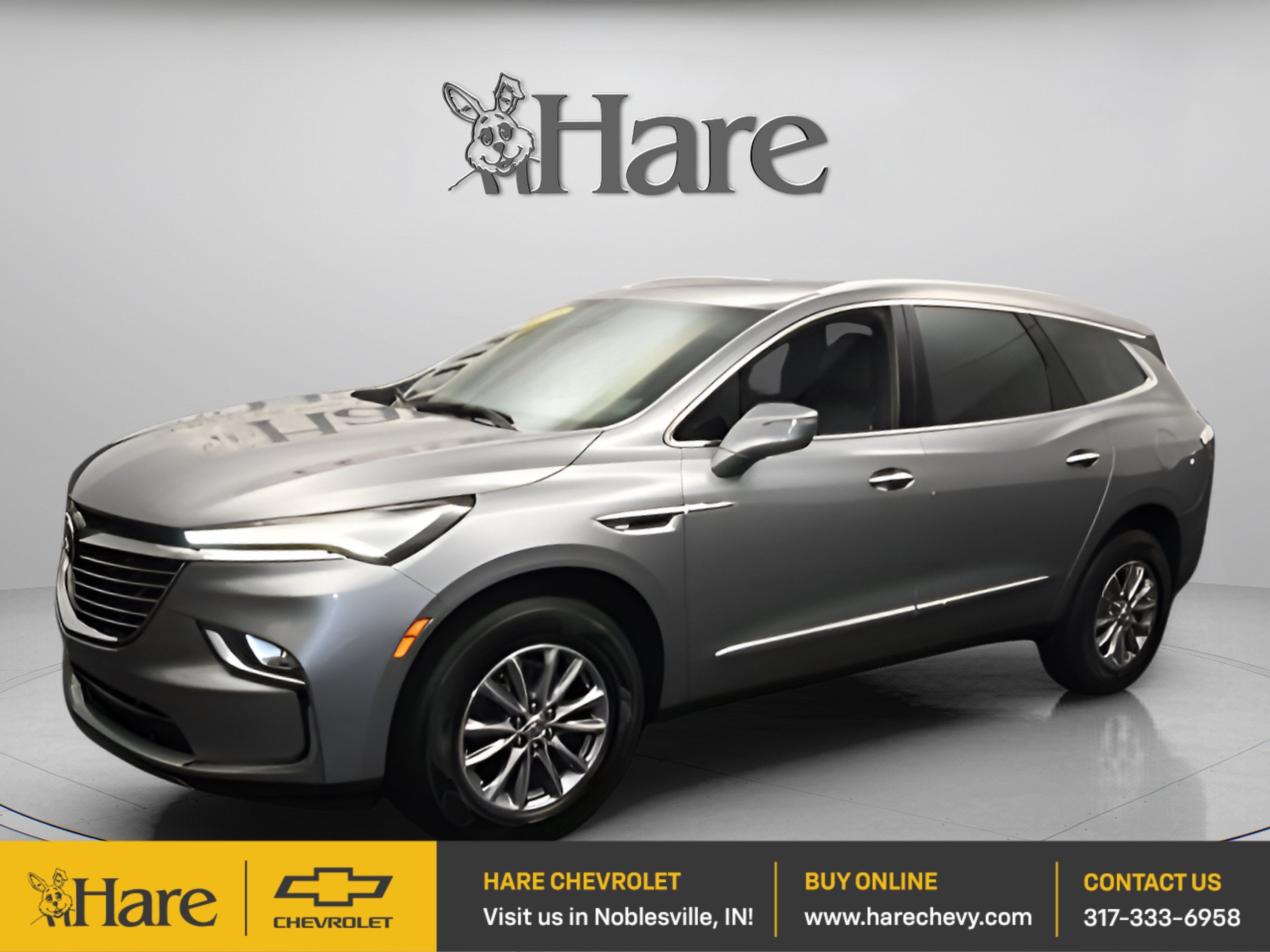 2023 Buick Enclave Essence in Moonstone Gray Metallic — front three-quarter view