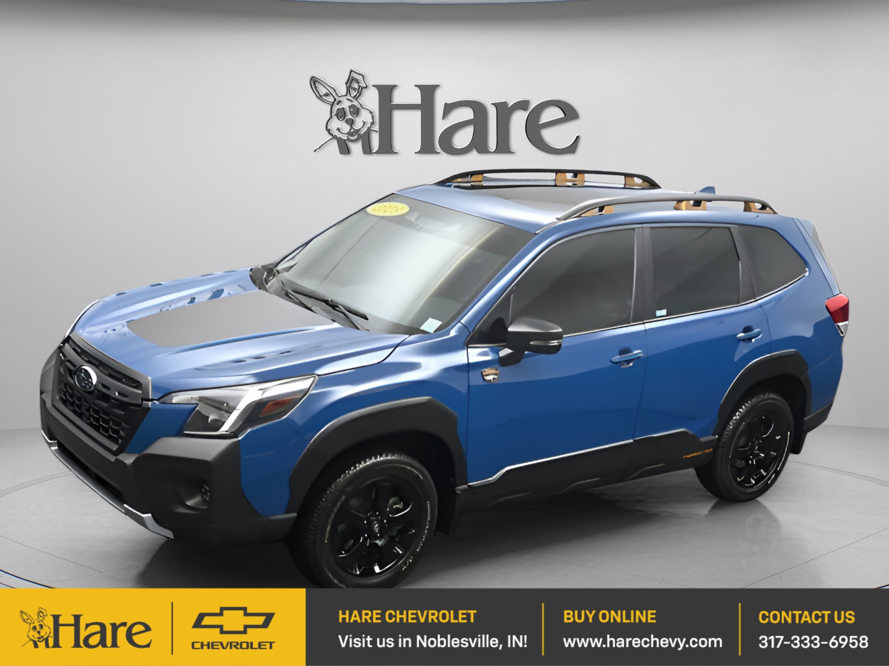 2023 Subaru Forester Wilderness in Blue — front three-quarter view