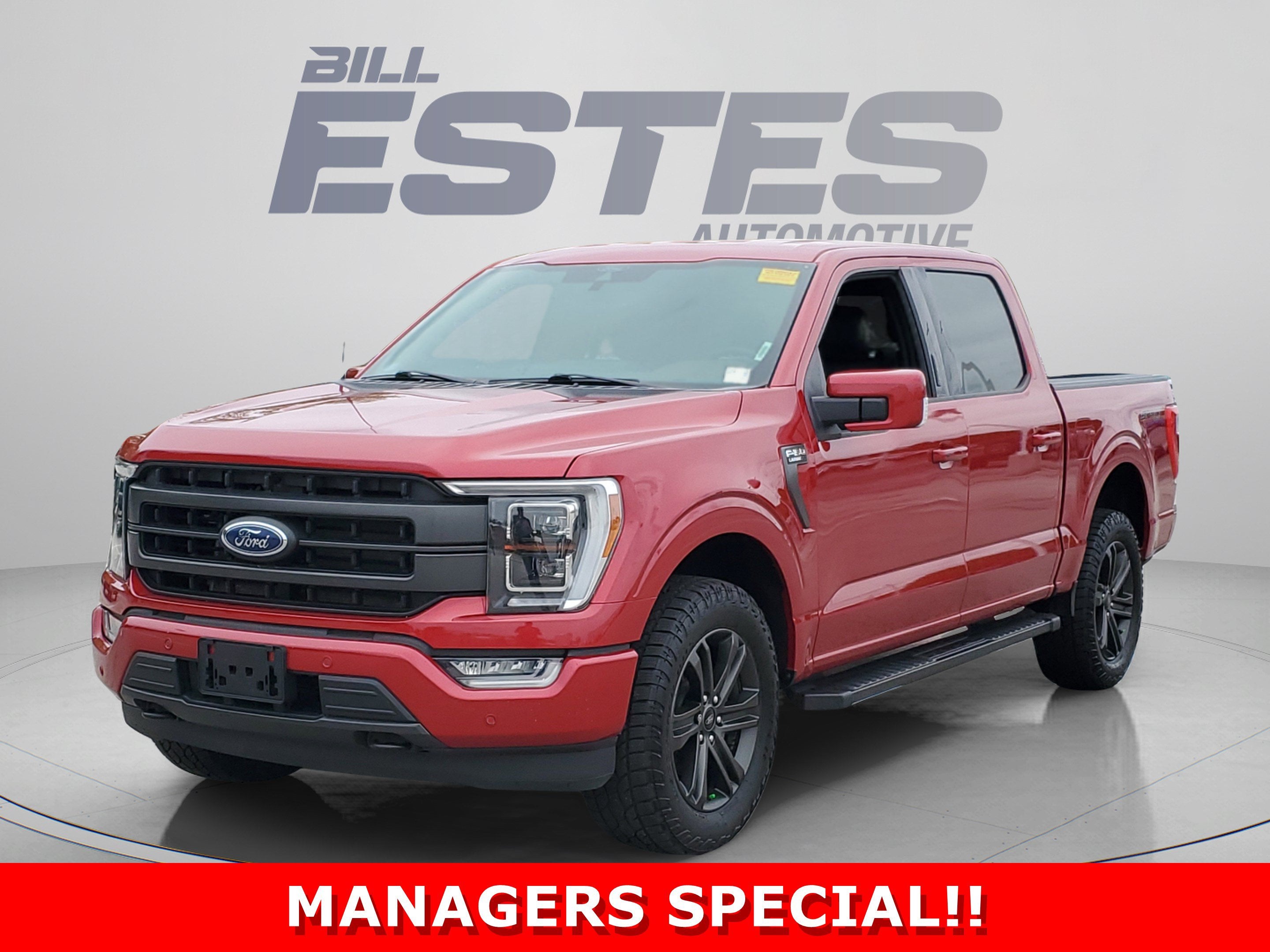 2022 Ford F-150 LARIAT in Rapid Red Metallic Tinted Clearcoat — front three-quarter view