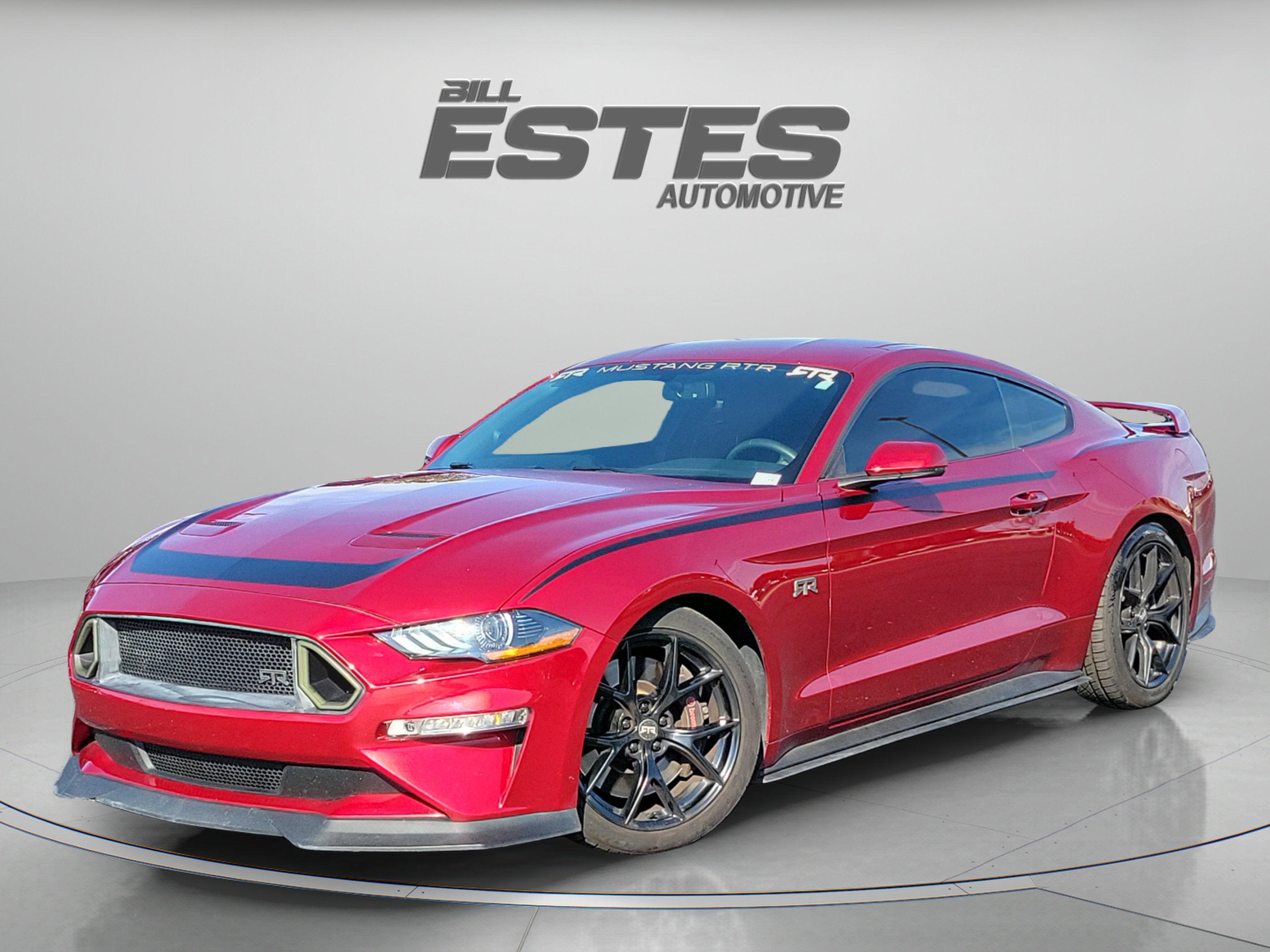 2019 Ford Mustang GT Premium in Ruby Red Metallic Tinted Clearcoat — front three-quarter view