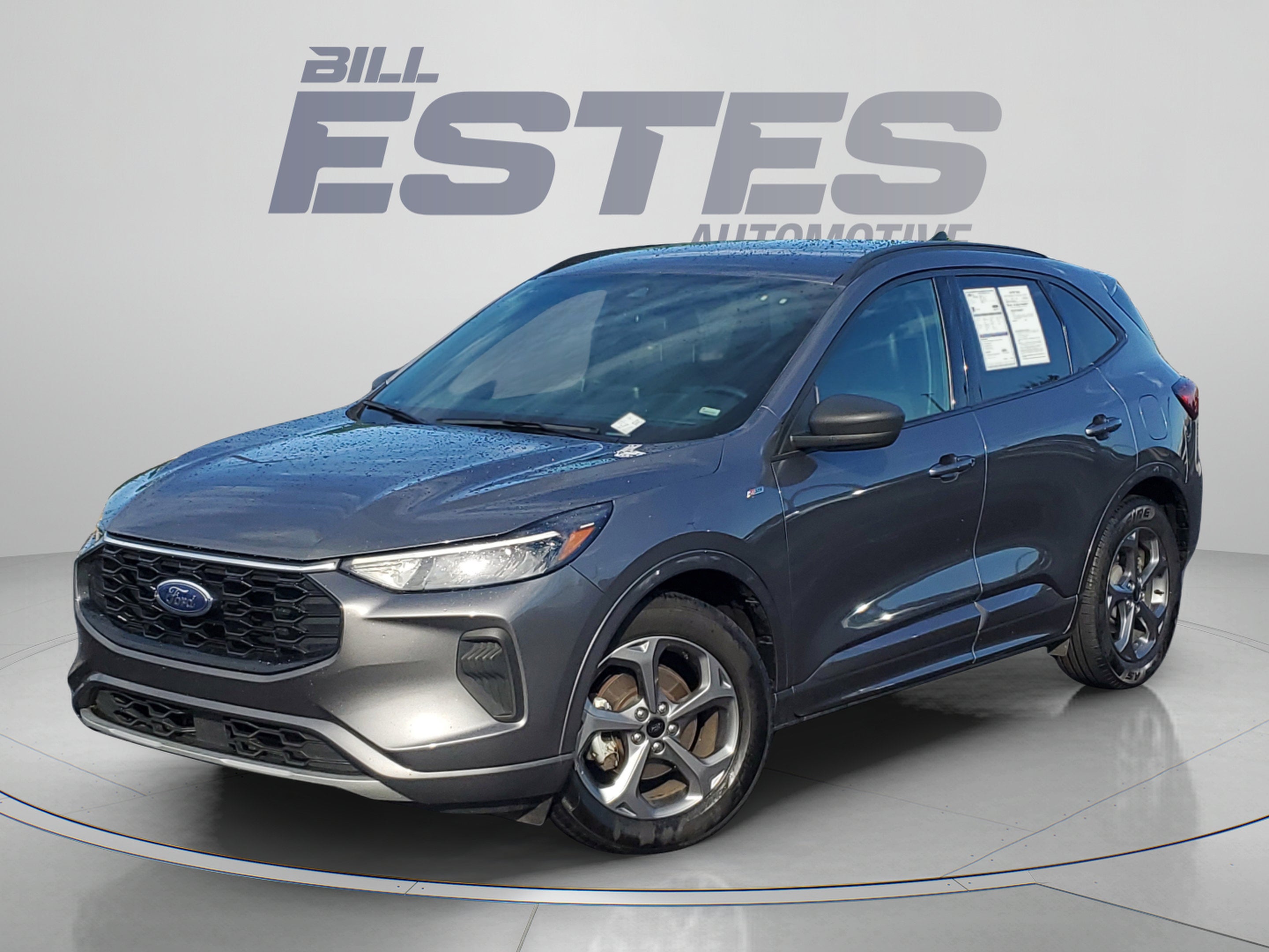 2024 Ford Escape ST-Line in Carbonized Gray Metallic — front three-quarter view