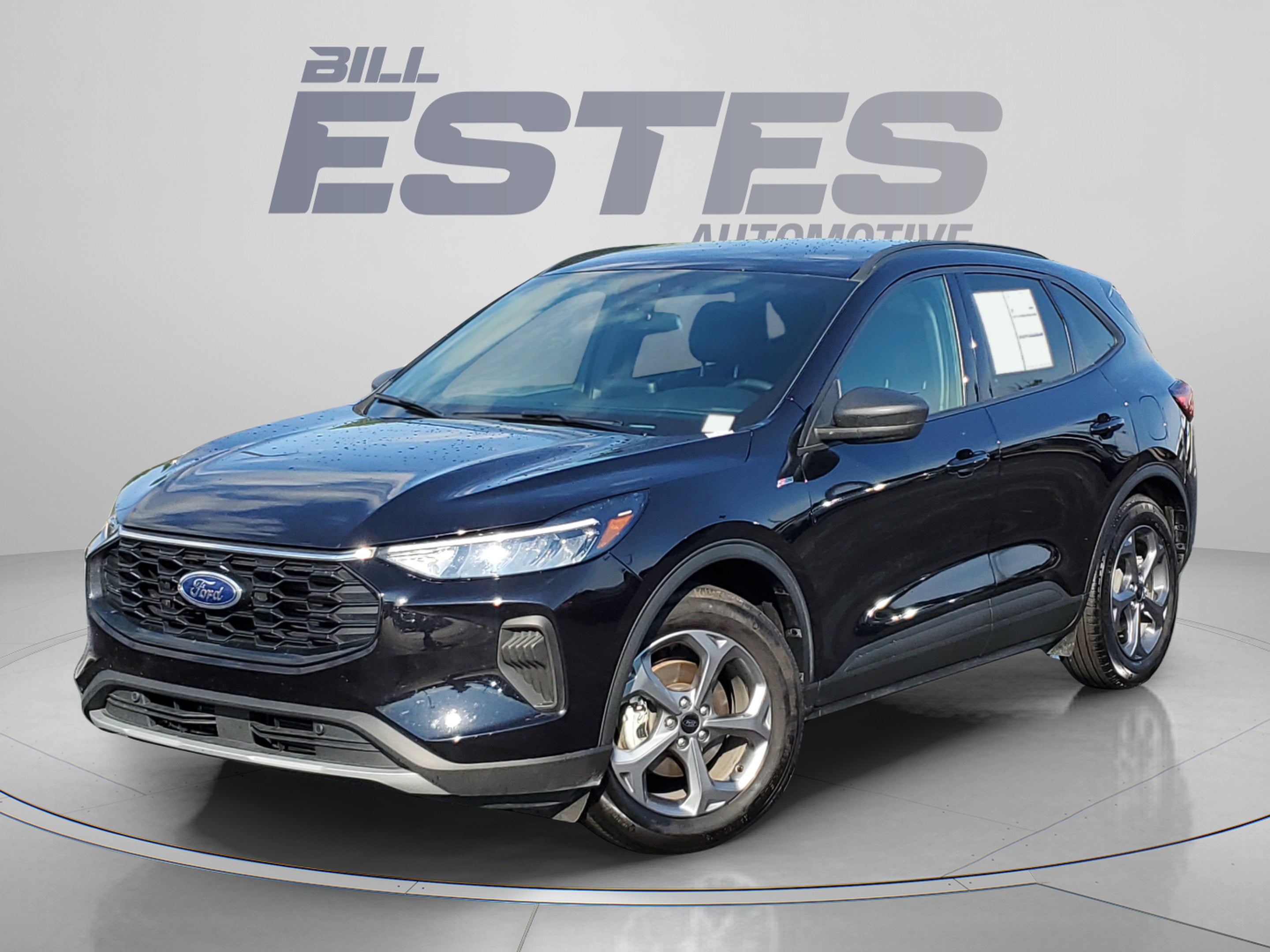 2025 Ford Escape ST-Line in Agate Black Metallic — front three-quarter view