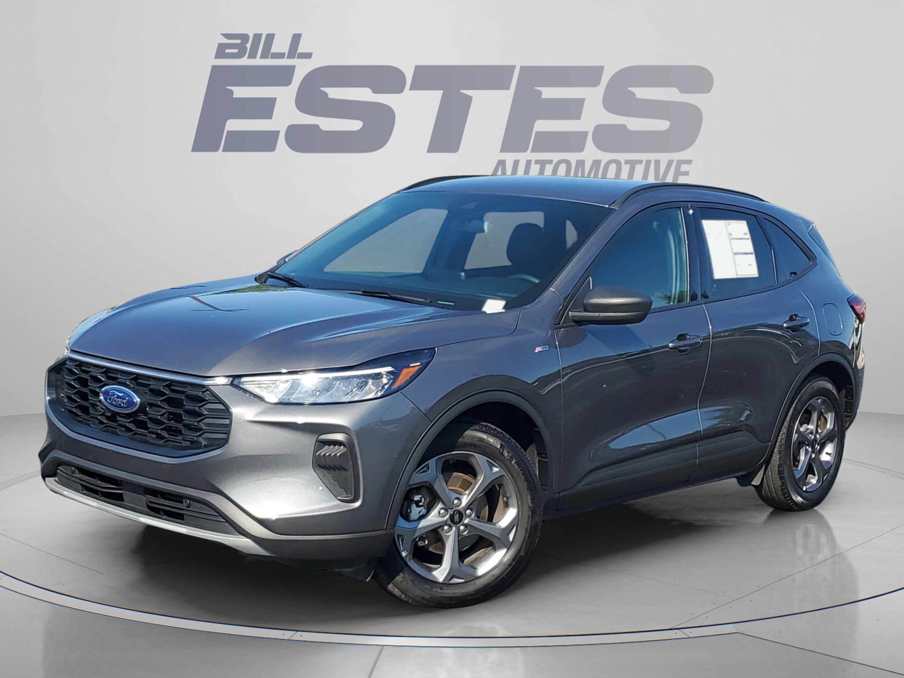 2025 Ford Escape ST-Line in Carbonized Gray Metallic — front three-quarter view