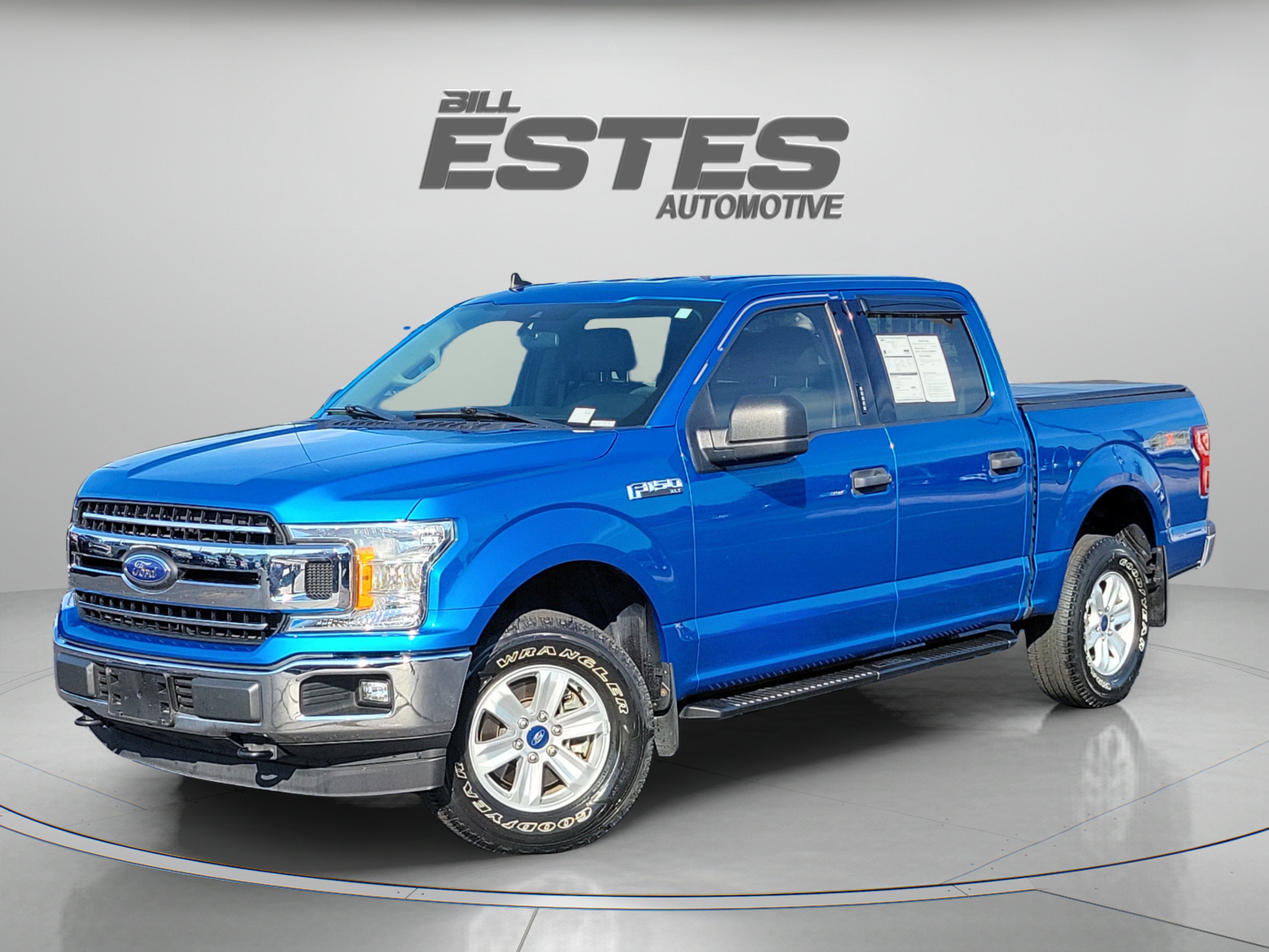 2019 Ford F-150 XLT in Velocity Blue Metallic — front three-quarter view