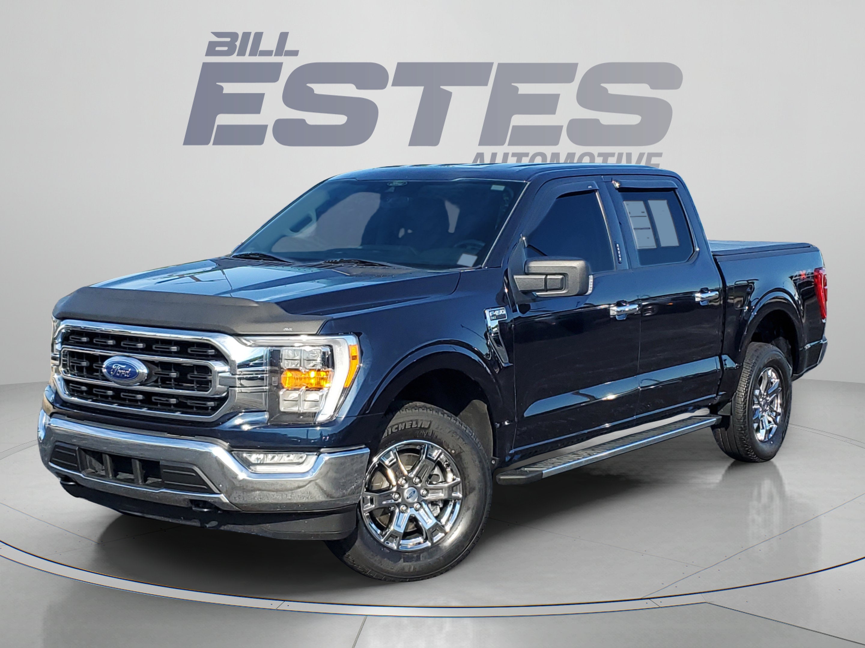 2022 Ford F-150 XLT in Antimatter Blue Metallic — front three-quarter view