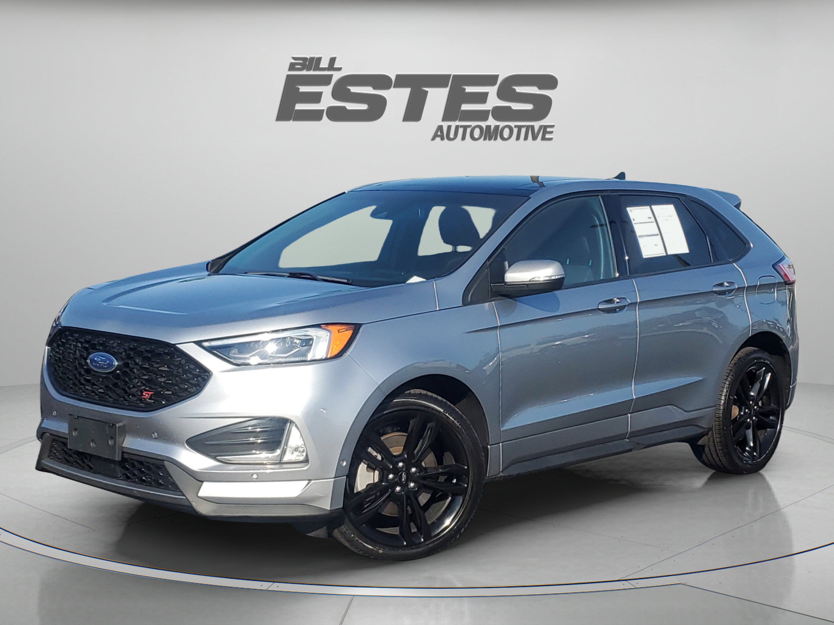 2022 Ford Edge ST in Iconic Silver Metallic — front three-quarter view