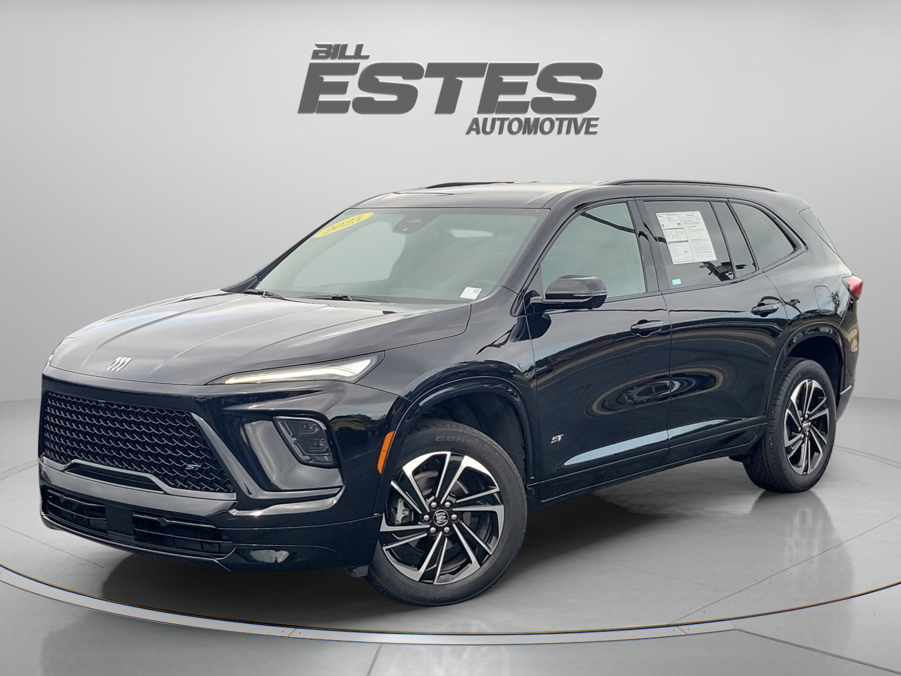 2025 Buick Enclave Sport Touring in Ebony Twilight Metallic — front three-quarter view