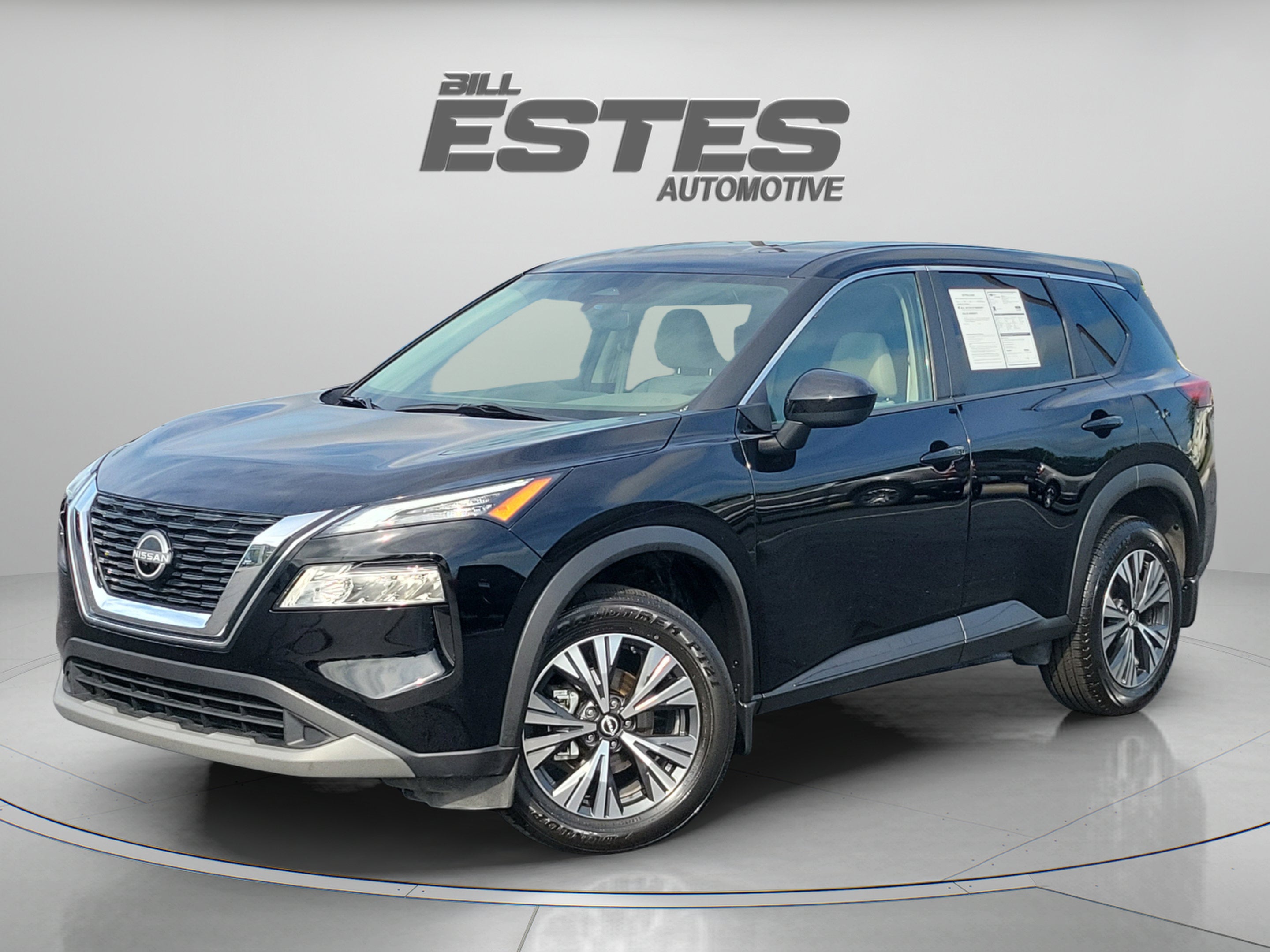 2023 Nissan Rogue SV in Super Black — front three-quarter view