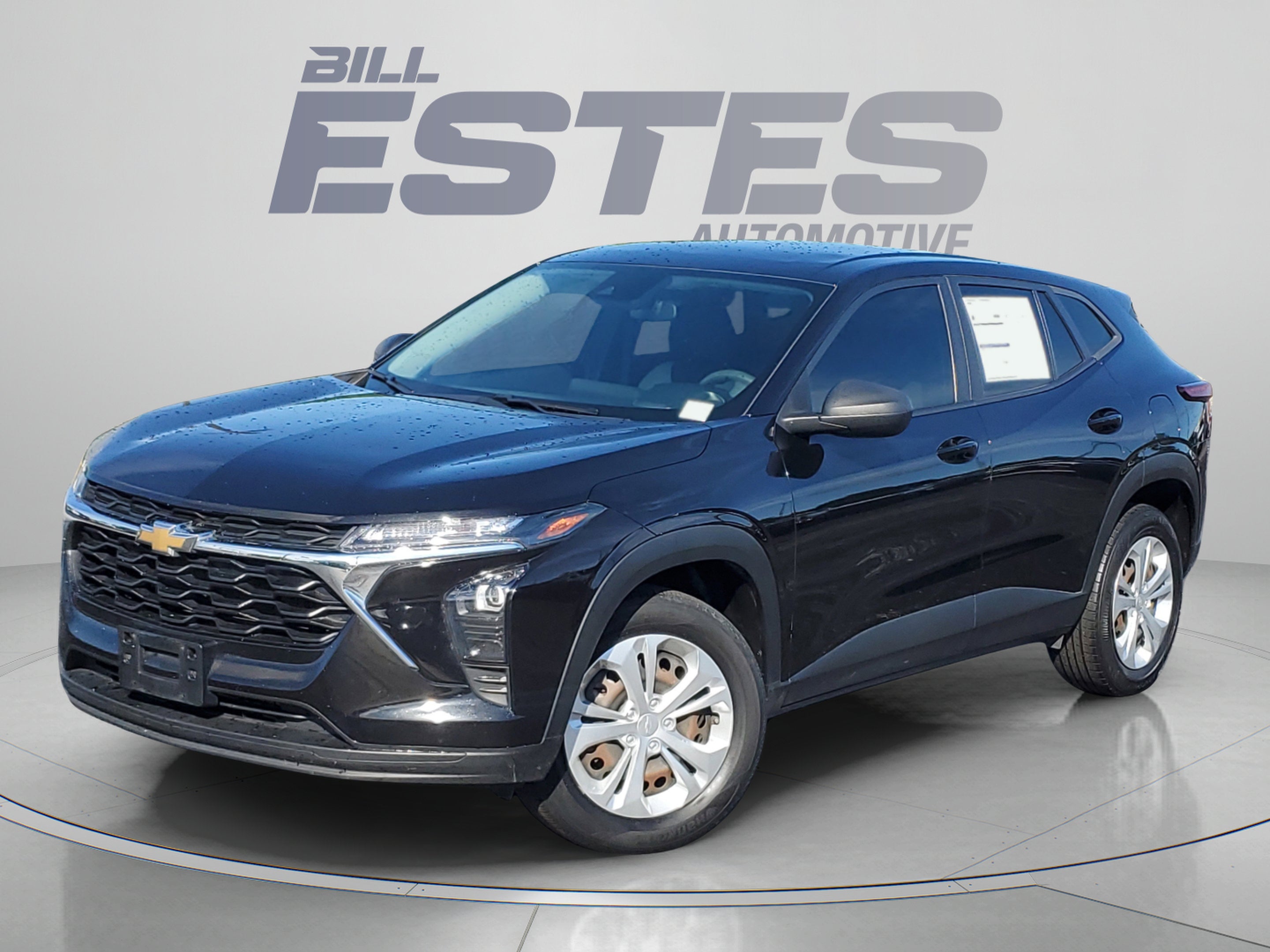 2024 Chevrolet Trax LS in Mosaic Black Metallic — front three-quarter view