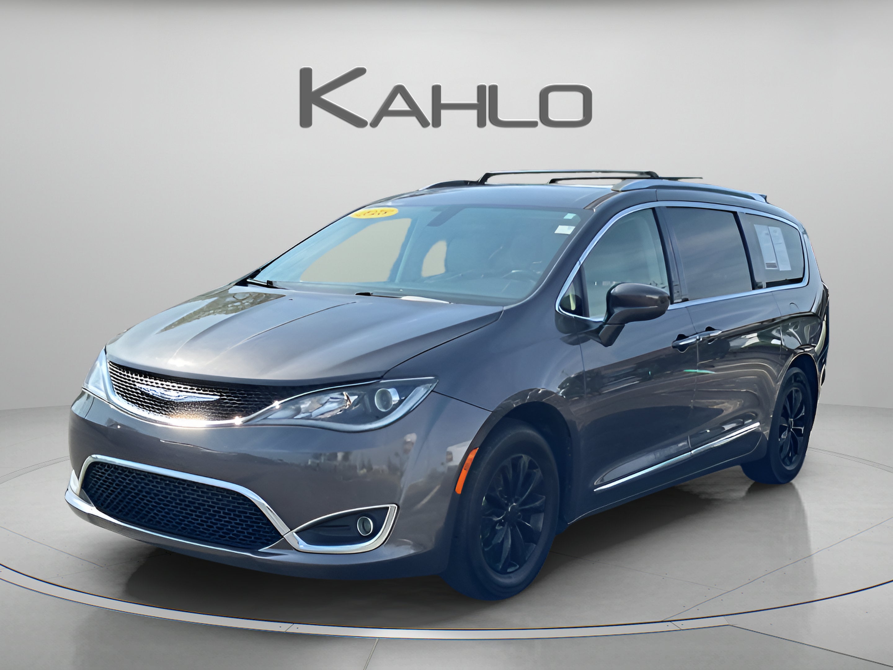2018 Chrysler Pacifica Touring L Plus in Granite Crystal Metallic Clearcoat — front three-quarter view