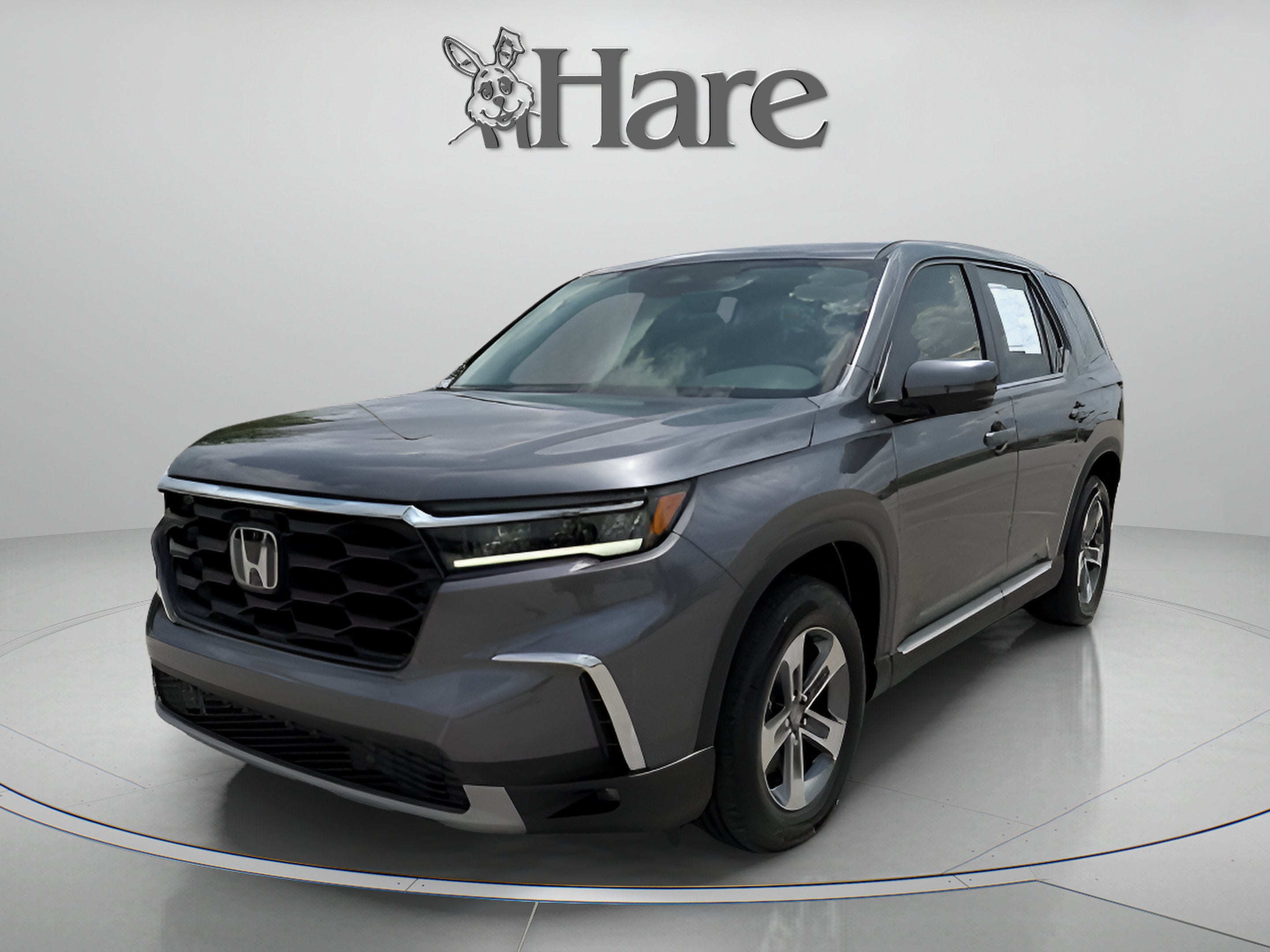 2025 Honda Pilot EX-L in Modern Steel Metallic — front three-quarter view