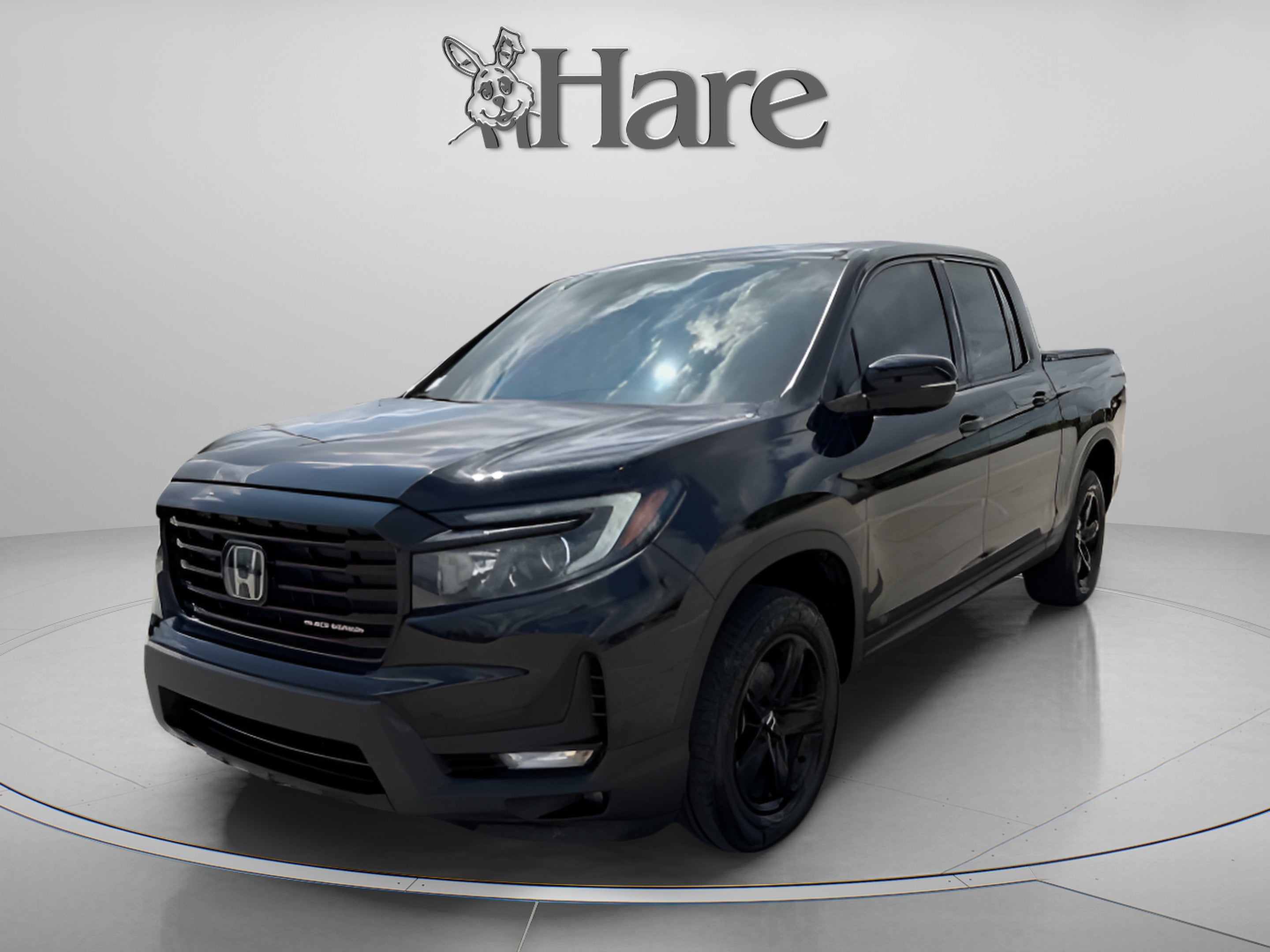 2023 Honda Ridgeline Black Edition in Crystal Black Pearl — front three-quarter view