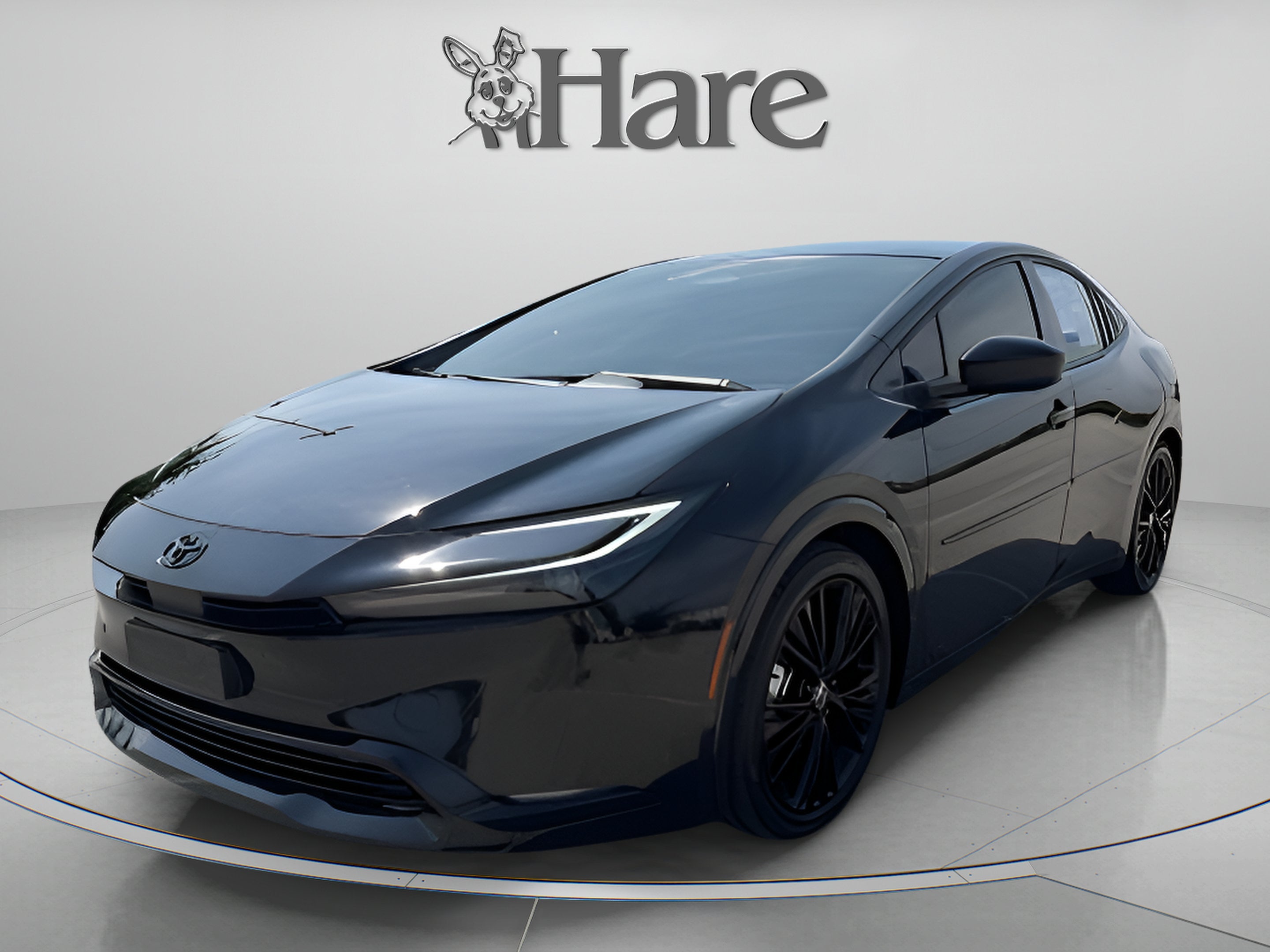 2025 Toyota Prius Nightshade in Midnight Black Metallic — front three-quarter view
